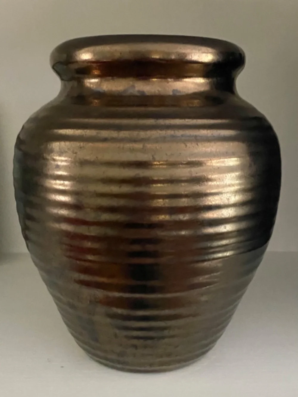 Vintage Bronze Painted Modern Ceramic Vase. Design of circular Lines on Tall Pot